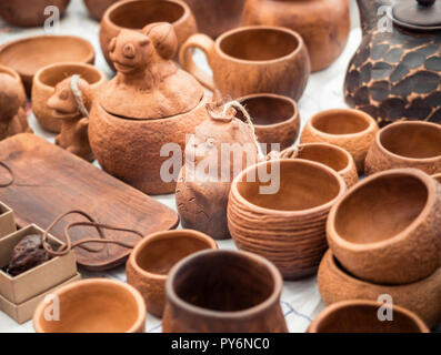 https://l450v.alamy.com/450v/py6nc0/handmade-clay-mugs-stands-on-the-counter-eco-friendly-cookware-pottery-cups-sale-py6nc0.jpg