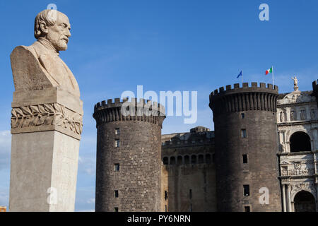 Statue of Giuseppe Mazzini in front of the Castel Nuovo in Naples Stock Photo