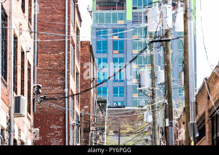 Asheville, USA Downtown old town street in hipster North Carolina NC famous town, city, nobody, many wires overhead cables, construction Stock Photo