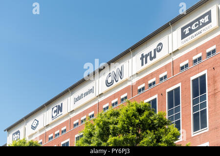 Atlanta, USA - April 20, 2018: CNN Center world headquarters and other cable news networks in downtown of city with signs Stock Photo
