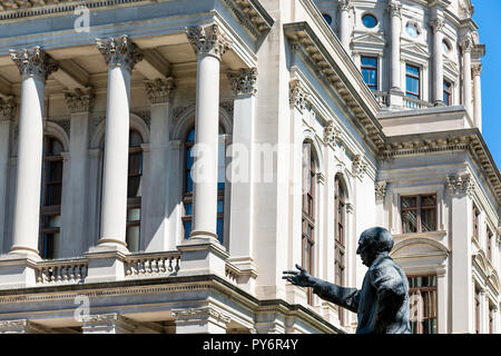 Atlanta, USA - April 20, 2018: Exterior state capitol building in Georgia with green park, statue of former Governor US Senator Richard B. Russell Stock Photo