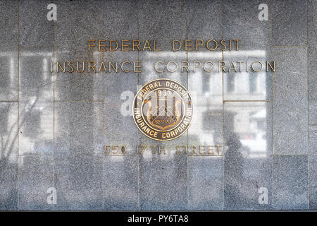 Washington DC, USA - March 9, 2018: Closeup of FDIC United States Federal Deposit Insurance Corporation sign on wall of headquarters building with log Stock Photo