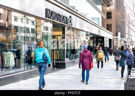 Washington DC, USA - March 9, 2018: Nordstrom rack store sign entrance shop in capital city street exterior, people walking on sidewalk Stock Photo