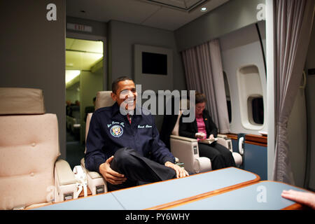 President Barack Obama wears an AF1 jacket on his first flight aboard Air Force One from Andrews Air Force Base to Newport News, Virginia 2/5/09. Official White House Photo by Pete Souza Stock Photo