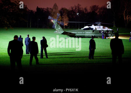 Marine One, carrying President Barack Obama and First Lady Michelle Obama, lands March 31, 2009, at Winfield House in London, England.  Official White House Photo by Pete Souza Stock Photo