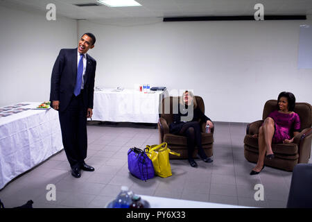 President Barack Obama joins First Lady Michelle Obama and Special Assistant to the President Melissa Winter during a staff hold prior to the start of the Strasbourg Town Hall Meeting in Strasbourg, France.  Official White House Photo by Pete Souza Stock Photo