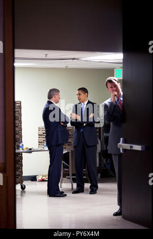 President Barack Obama talks alone with Prime Minister Stephen Harper of Canada during the Summit of the Americas April 18, 2009, in Port of Spain, Trinidad.  Official White House Photo by Pete Souza Stock Photo