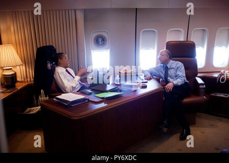President Barack Obama meets with Interior Secretary Ken Salazar aboard Air Force One during a flight to Denver, Colorado 2/17/09.  Official White House Photo by Pete Souza Stock Photo