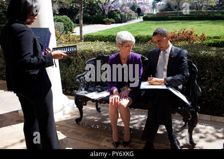 President  Barack Obama and Staff Secretary Lisa Brown on the Colonnade prior to H.R. 146, the Omnibus Public Lands Management Act Bill signing ceremony.  Official White House Photo by Pete Souza Stock Photo