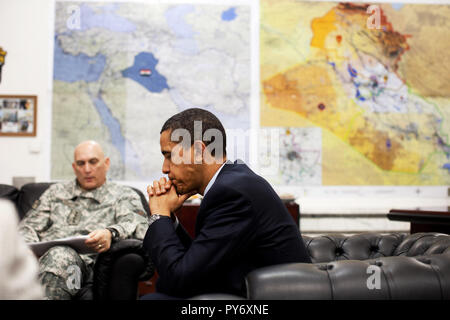 President Barack Obama meets with General Raymond T. Odierno, Commanding General, Multi-National Force-Iraq, during  the President's visit with U.S. troops at Camp Victory, Baghdad, Iraq 4/7/09.  Official White House Photo by Pete Souza Stock Photo