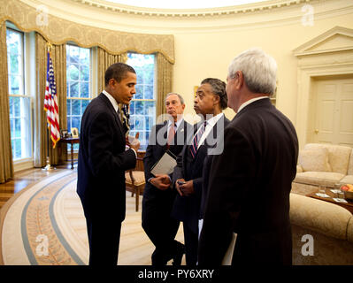 President Barack Obama meets in the Oval Office with New York Mayor Michael Bloomberg, Rev. Al Sharpton, and former Speaker of the House Newt Gingrich to discuss education reform May 7, 2009.  Official White House Photo by Pete Souza.  This official White House photograph is being made available for publication by news organizations and/or for personal use printing by the subject(s) of the photograph. The photograph may not be manipulated in any way or used in materials, advertisements, products, or promotions that in any way suggest approval or endorsement of the President, the First Family,  Stock Photo