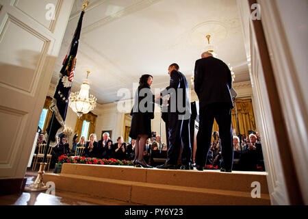 President Barack Obama shakes hands with Judge Sonia Sotomayor after announcing her as his nominee for the U.S. Supreme Court to replace retiring Justice David Souter in the East Room of the White House, May 26, 2009. (Official White House Photo by Chuck Kennedy)  This official White House photograph is being made available for publication by news organizations and/or for personal use printing by the subject(s) of the photograph. The photograph may not be manipulated in any way or used in materials, advertisements, products, or promotions that in any way suggest approval or endorsement of the  Stock Photo
