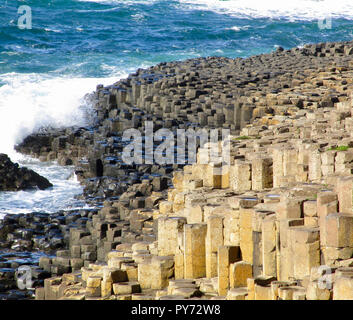 View of the hexagon shaped basalt stone columns in the landscape of Giant's Causeway in Northern Ireland