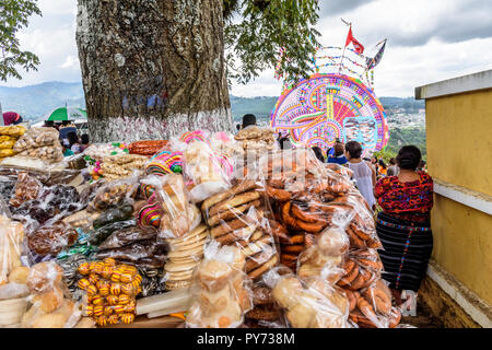 Santiago Sacatepequez, Guatemala - November 1, 2017: Sweet stall at Giant kite festival in town cemetery on All Saints Day. Stock Photo