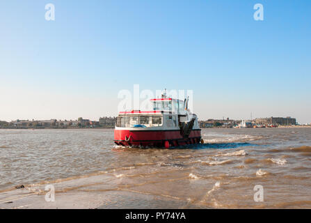 Ferry boat from Fleetwood crossing the river Wyre estuary and approaching the slipway at Knott End on Sea Lancashire England UK Stock Photo