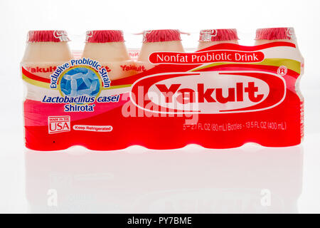 Winneconne, WI - 10 October 2018: A package of  Yakult nonfat probiotic drink on an isolated background Stock Photo