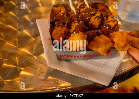 Rotterdam, Netherlands - 16 July, 2016: Churros with chocolate cream on display at Markthal in Roterdam Stock Photo