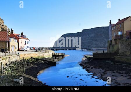 Taken to capture beautiful colourations, during a remarkably sunny day in late Autumn, within the North Yorkshire fishing village, of Staithes. Stock Photo