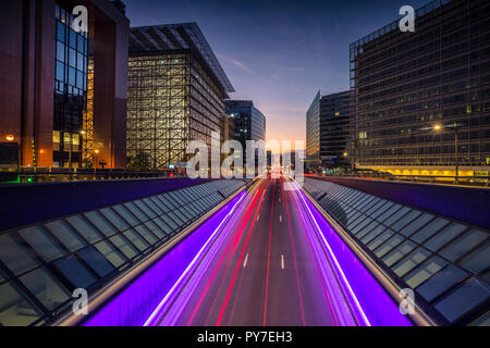 Traffic lights and modern architecture in Brussels at night Stock Photo