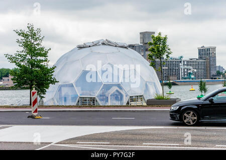 Rotterdam, Netherlands - 16 July, 2016:  Morning view on the Rijn haven with floating pavilion. This construction is a hotspot for culture, festivals  Stock Photo