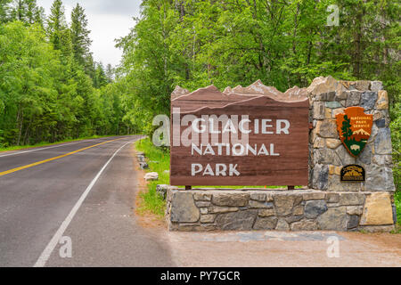 Welcome sign at the entrance to Glacier National Park, Montana Stock Photo