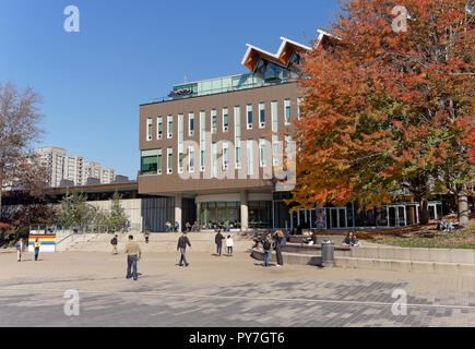 Students on  on the campus of the University of British Columbia on a sunny day in the fall, Vancouver, BC, Canada Stock Photo