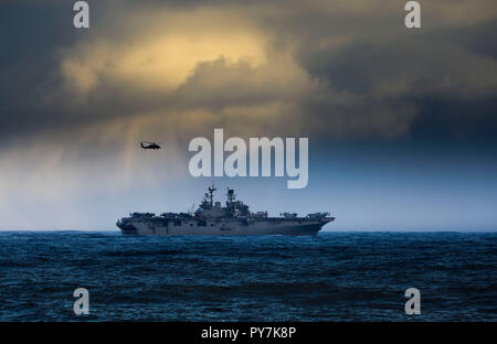 US Navy amphibious assault ship USS Iwo Jima, part of a NATO task force, sails near Iceland October 23, 2018 carrying elements of 45 Commando Royal Marines and US Marines traveling to NATO exercise Trident Juncture 2018. With around 50,000 participants from 31 nations, Trident Juncture 2018 is one of NATO's largest exercises in recent years. Around 250 aircraft, 65 ships and more than 10,000 vehicles are involved in the exercise. Photo: PO(Phot) Jim Gibson, Royal Navy Reserve Stock Photo