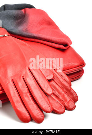 Red leather gloves, purse and scarf isoated on white Stock Photo