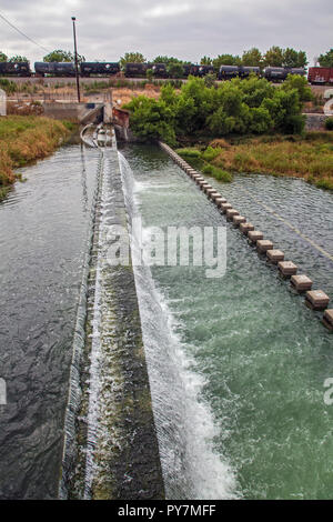 Tertiary-treated recycled water from the San Jose Creek Water Reclamation Plant is diverted to the unlined San Gabriel River for infiltration into the Stock Photo