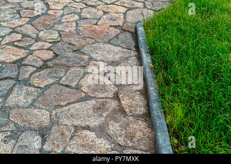 Fragment of cobblestone pavement Stock Photo