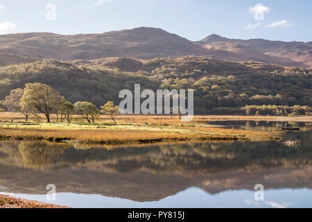 Autumn reflections on Llyn Dinas in the Nant Gwynant Valley, Snowdonia National Park, North Wales, UK Stock Photo