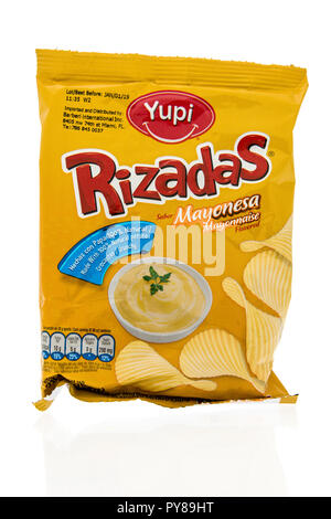 Winneconne, WI - 25 October 2018:  A bag of Yupi Rizadas chips in mayonnaise flavor from Colombia on an isolated background. Stock Photo