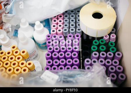 Fryazino, Russia - 06 11 2018: multi-colored blood tubes, plaster, jars in the drawer of the medical center table Stock Photo