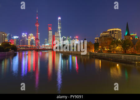 Pudong Skyline during the blue hour with golden week lighting Stock Photo