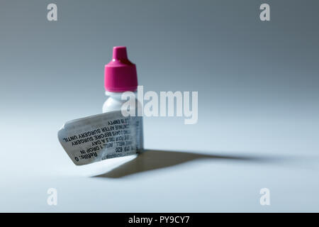 Pink cap eye drop bottle antibiotic prescription medicine Stock