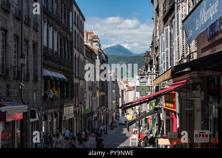 Clermont-Ferrand (central France): 'rue des Gras' street in the town centre. in the background, the 'Puy de Dome' lava dome Stock Photo