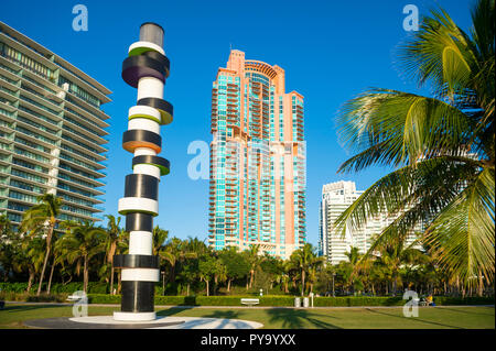 MIAMI - CIRCA SEPTEMBER, 2018: Obstinate Lighthouse, an installation by German artist Tobias Rehberger, stands amidst the condo towers at South Pointe Stock Photo