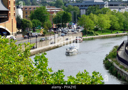 Small pleasure boat on the River Medway in the centre of Maidstone, Kent, England, UK. Stock Photo