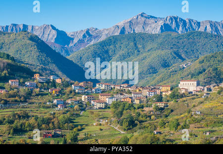 Idyllic landscape with the village of Poggio and the Apuan Alps in the background. Province of Lucca, Tuscany, central Italy. Stock Photo