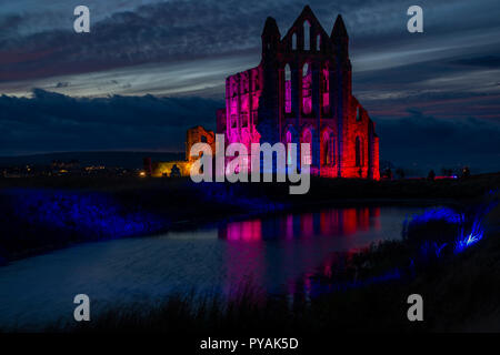 Illuminated Whitby Abbey in Whitby, North Yorkshire Stock Photo
