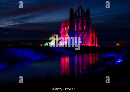 Illuminated Whitby Abbey in Whitby, North Yorkshire Stock Photo