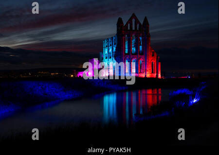 Illuminated Whitby Abbey in Whitby, North Yorkshire Stock Photo