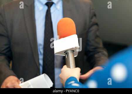Broadcast journalism. Microphone. Stock Photo