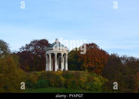 The famous Monopteros structure in English Garden in Munich, Germany during October, Autumn season ... Colored trees and fresh air. Stock Photo