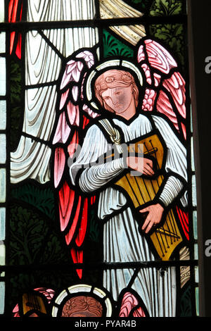 Stained glass by Morris and Co, St Marys Church, Buscot village. Oxfordshire. Stock Photo