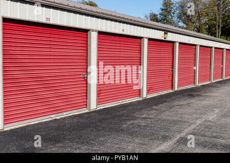 Numbered self storage and mini storage garage units Stock Photo