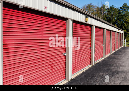 Numbered self storage and mini storage garage units Stock Photo