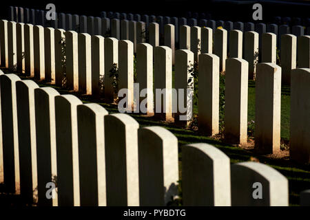 War graves in the autumn sunlight at Y Ravine cemetery near Beaumont-Hamel on the Somme battlefield in France Stock Photo