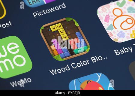 London, United Kingdom - October 26, 2018: Close-up shot of the Wood Color Block: Puzzle Game application icon from LIHUHU PTE. LTD. on an iPhone. Stock Photo