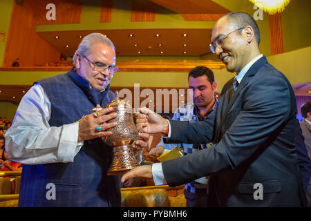 Srinagar, India. 26 October 2018.  Governor Satya Pal Malik seen being honoured with traditional samovar by the JK tourism department during the tour.Governor Satya Pal Malik inaugurated a three day Kashmir Autumn FAM (Familiarisation) Tour-2018,  The state is bestowed with natural beauty and landscape, besides diverse culture, amazing art and craft, sumptuous cuisine and unique music that Credit: ZUMA Press, Inc./Alamy Live News Stock Photo